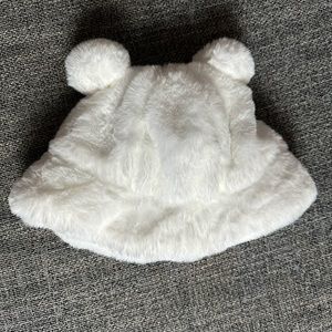 Fuzzy white bucket hat with 2 puffs balls